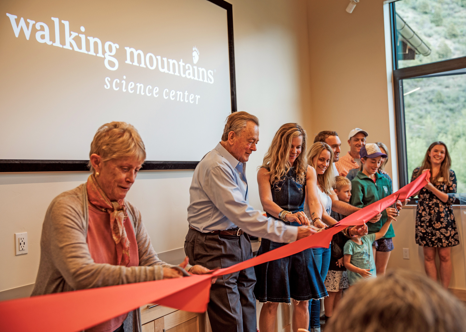 Jay Precourt at a ribbon cutting for Walking Mountains in 2019