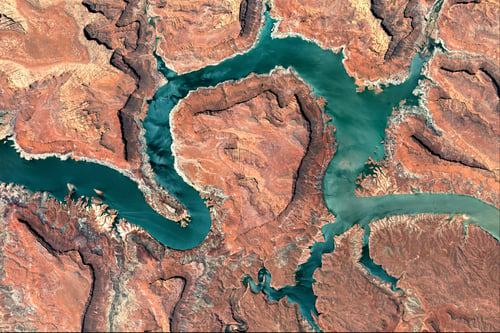 Colorado River, Lake Powell and Trachyte Canyon looking down aerial view from above