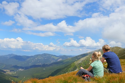 Mother & Daughter Cloudwatching in Mountains