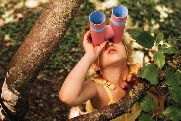 kid exploring in summer day in park 600x400