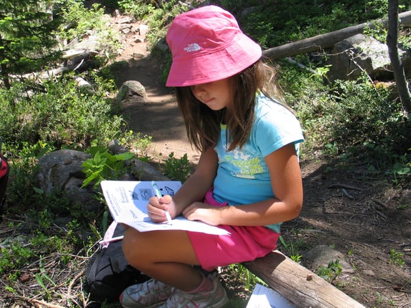 pink hat girl with journal